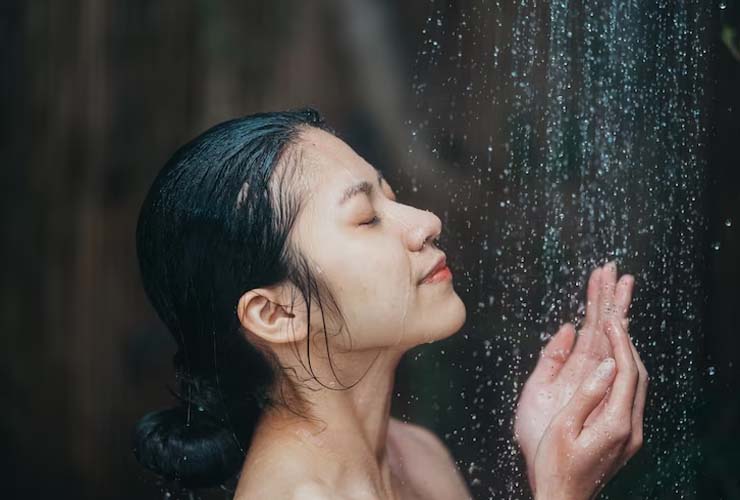 Women taking cool shower/bath