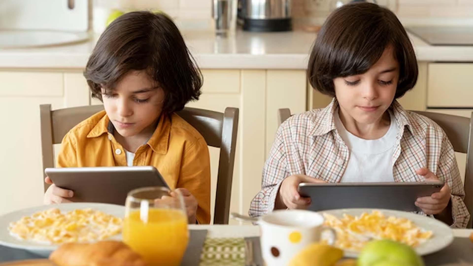 Children Watching Mobiles Without Eating