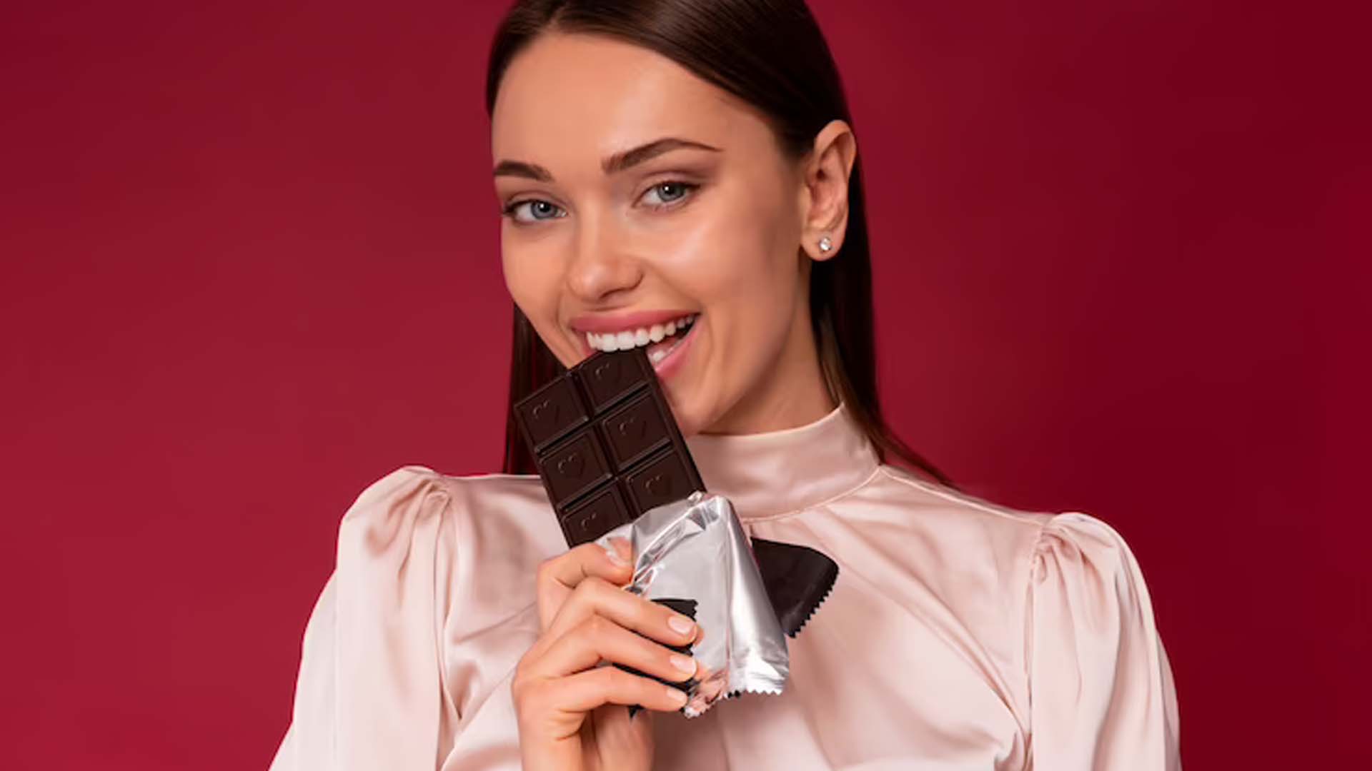 Women eating dark Chocolate