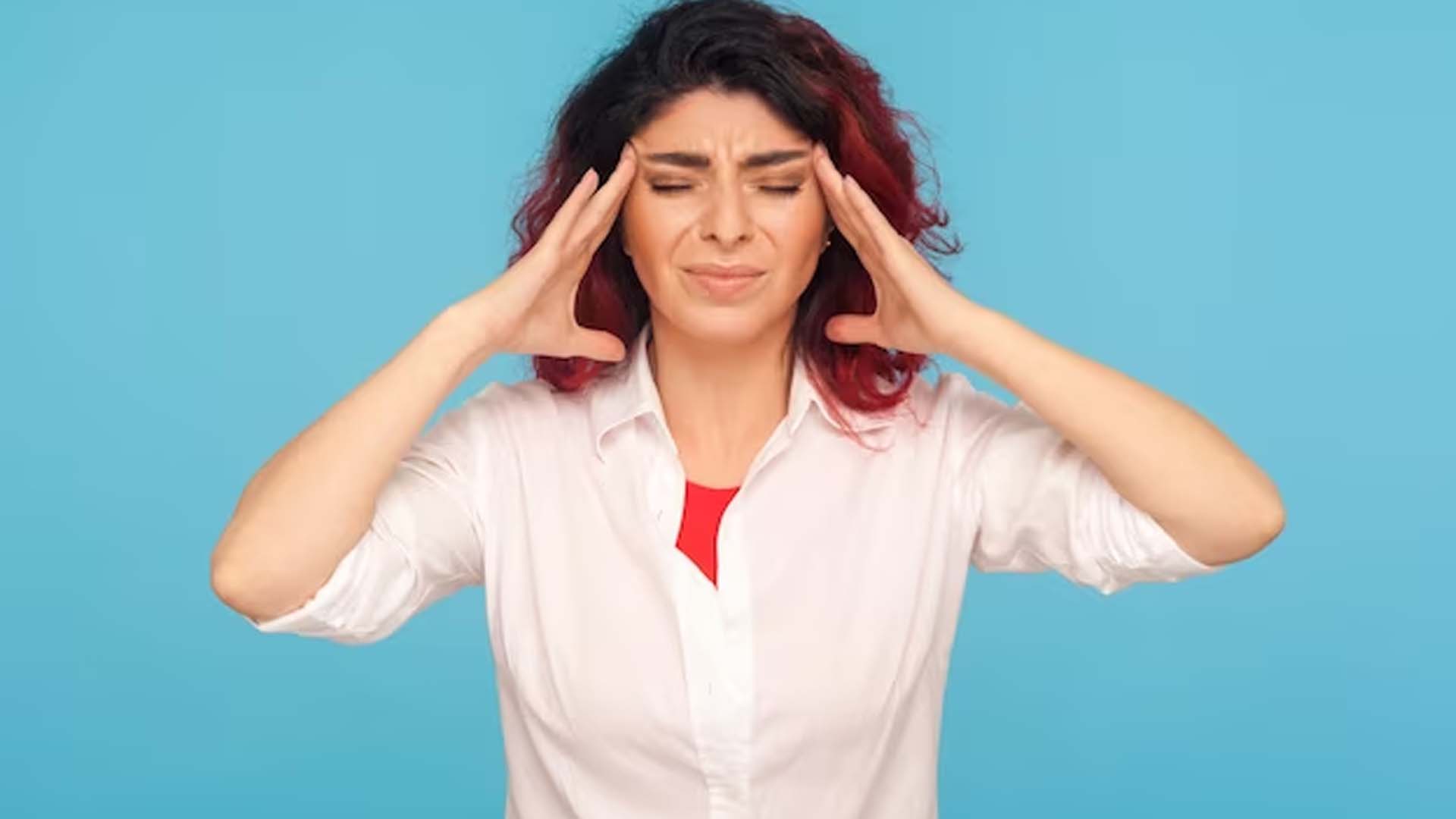 Women suffering from Migraine Headache