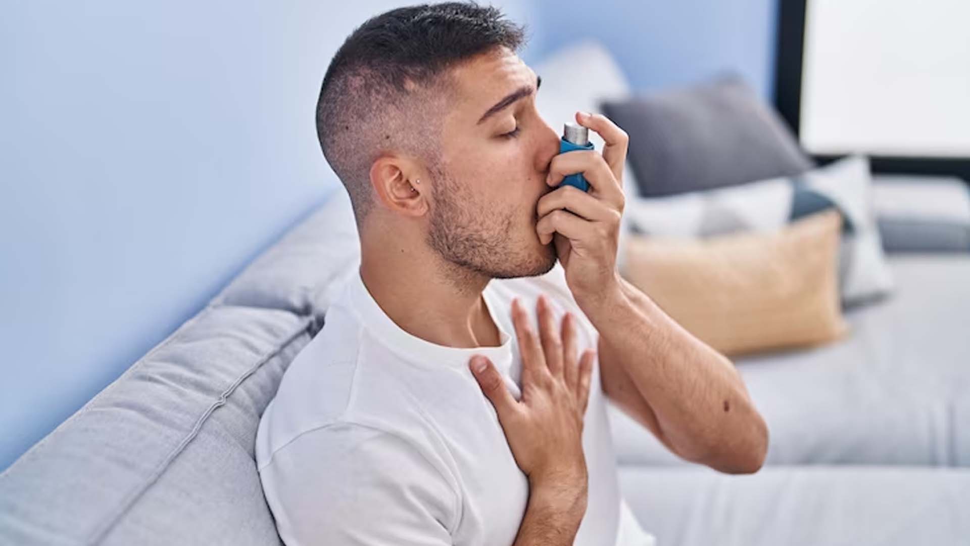 Man using inhaler