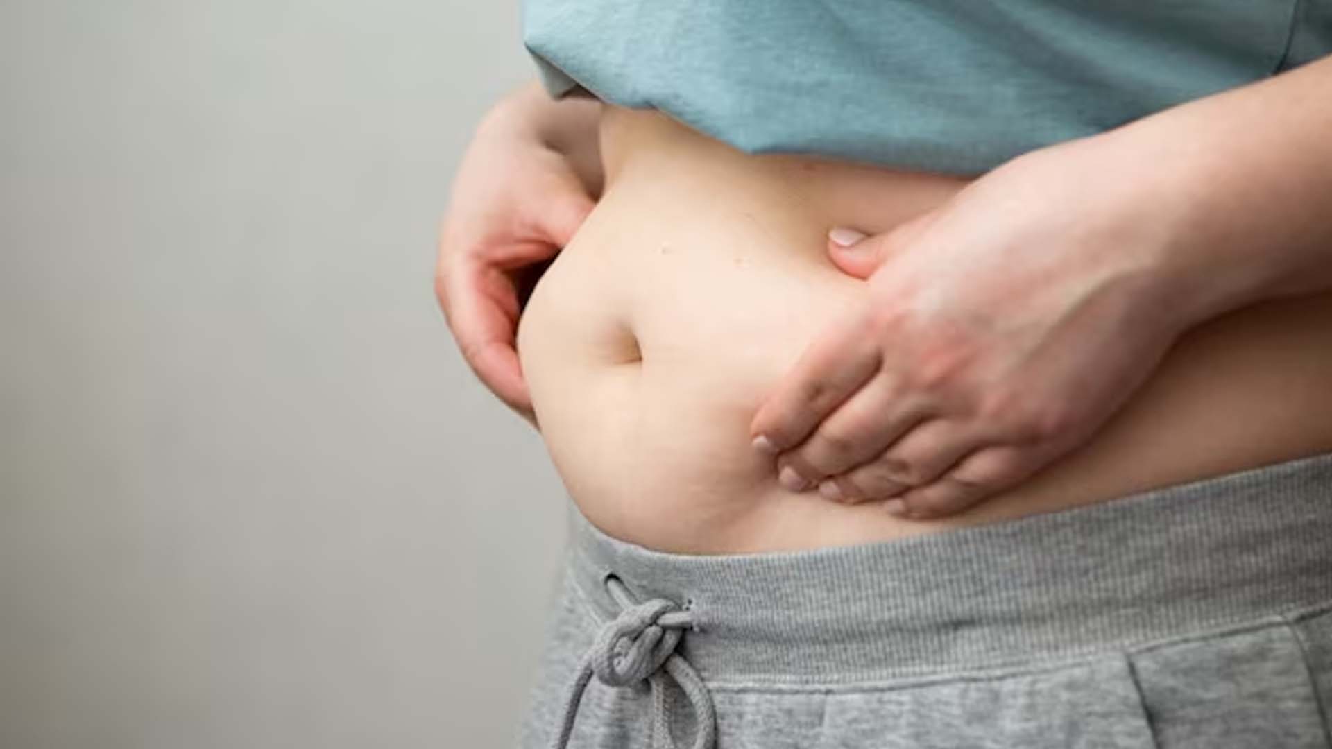 Women holding Belly