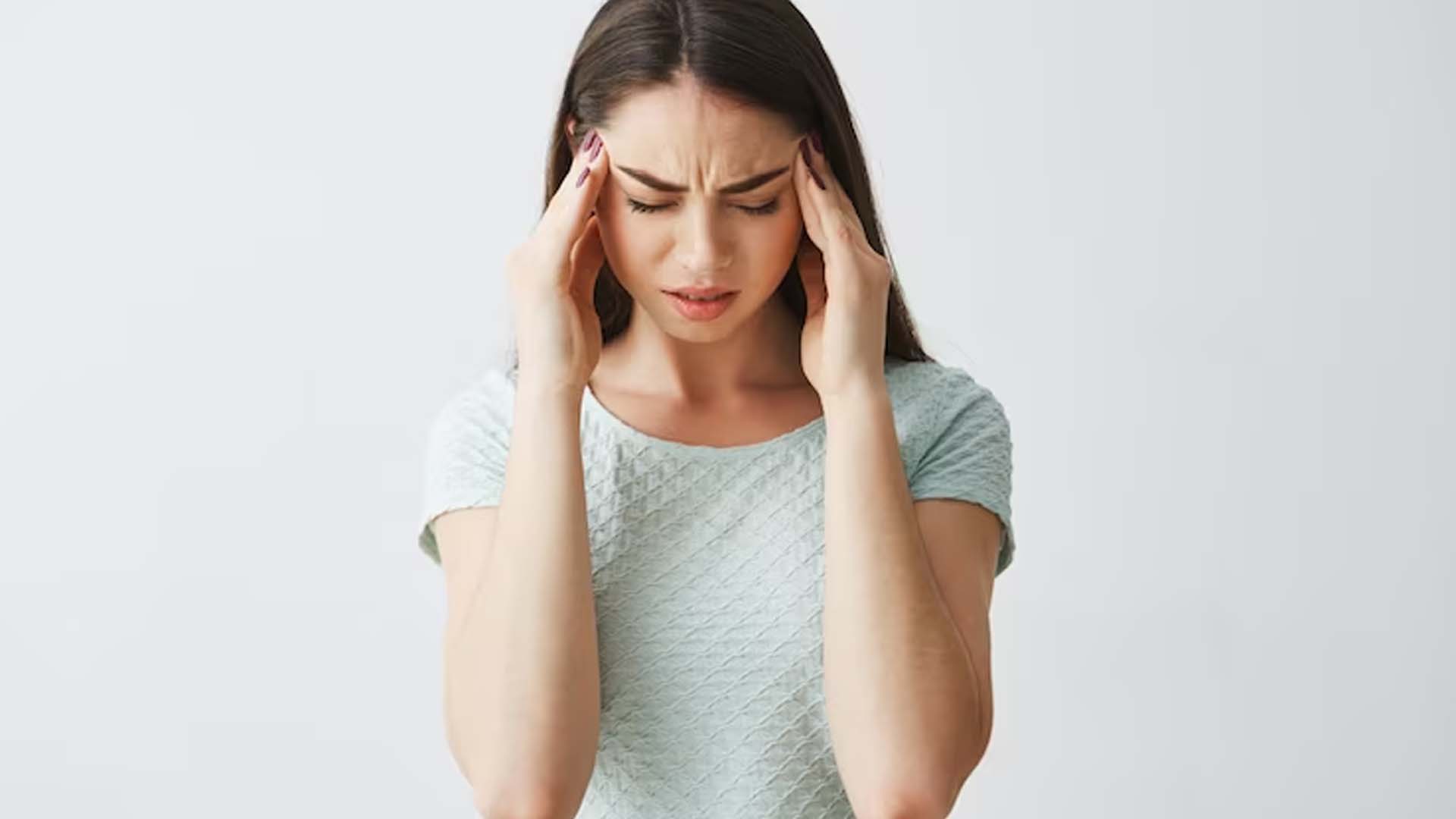 Women suffering from headache
