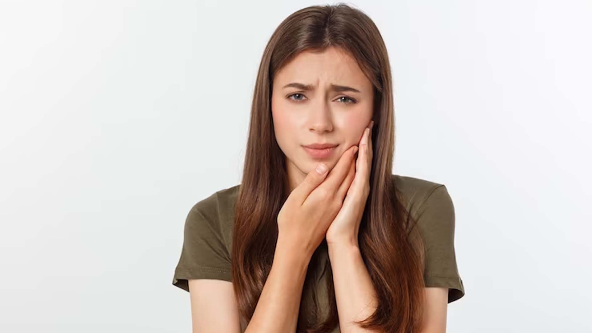 Person suffering Sensitive Teeth