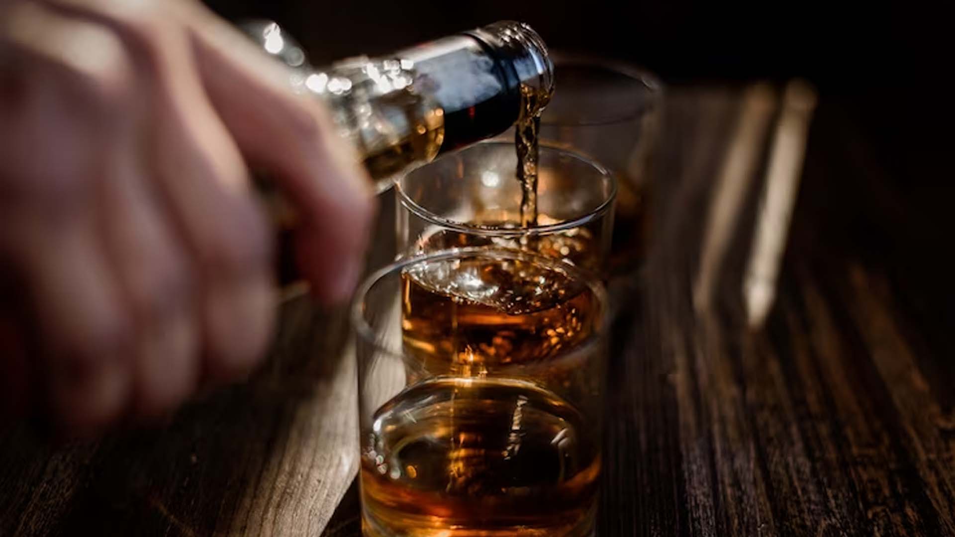 Pouring Alcohol in Glasses