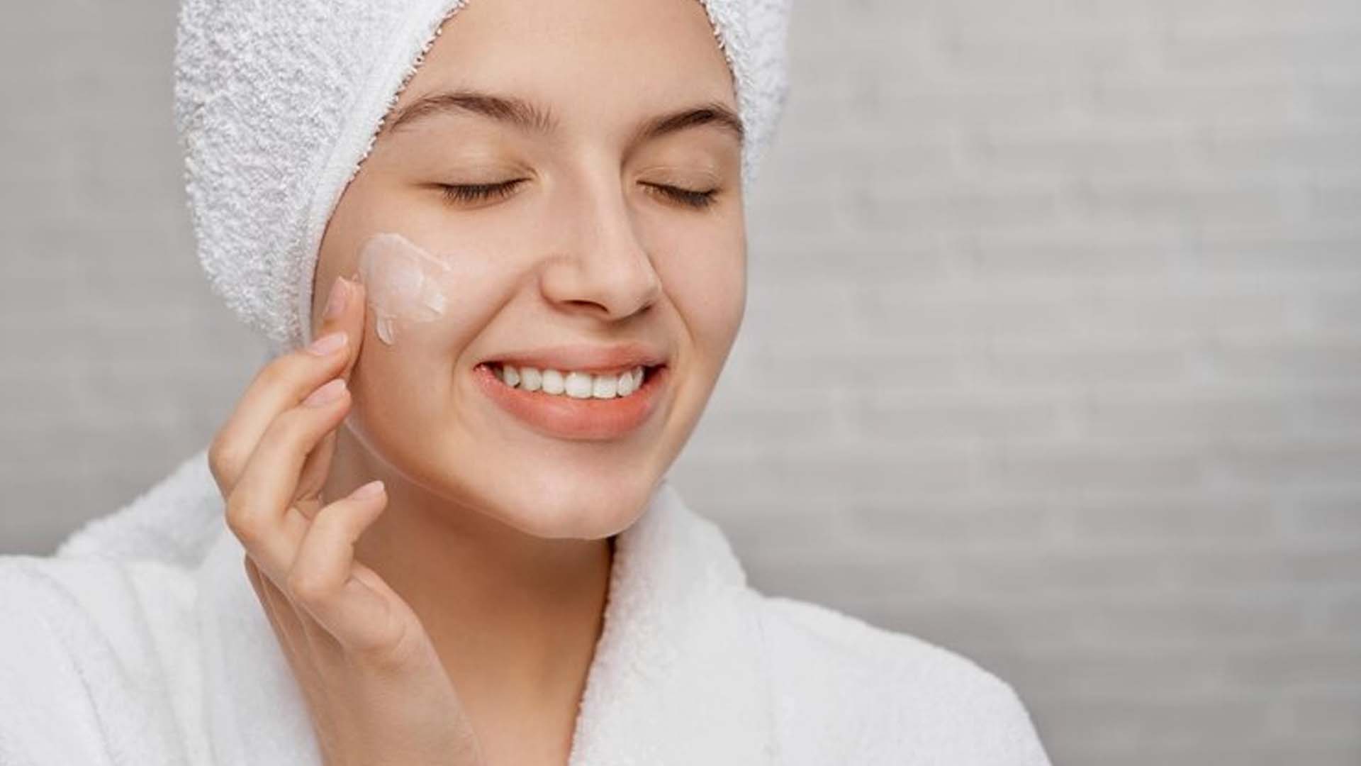 Applying cream on Face