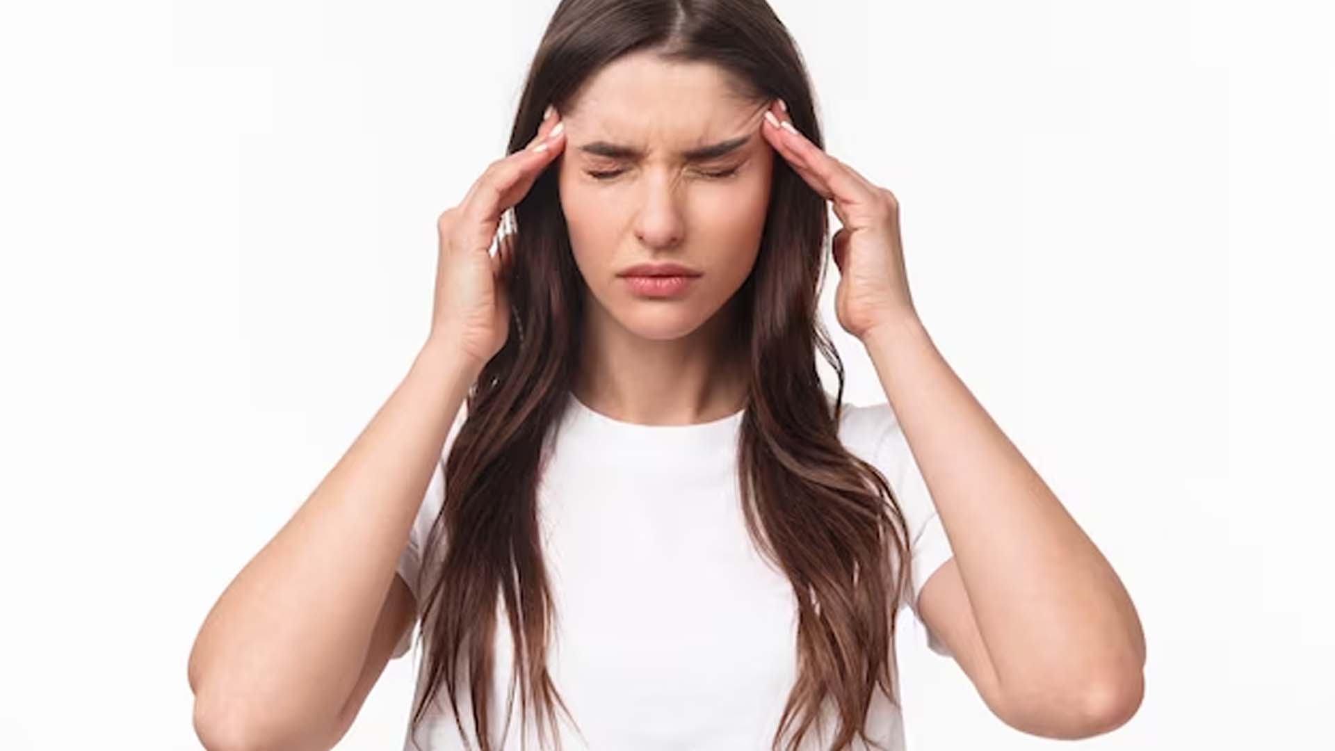 Women Holding her Head with Dizziness