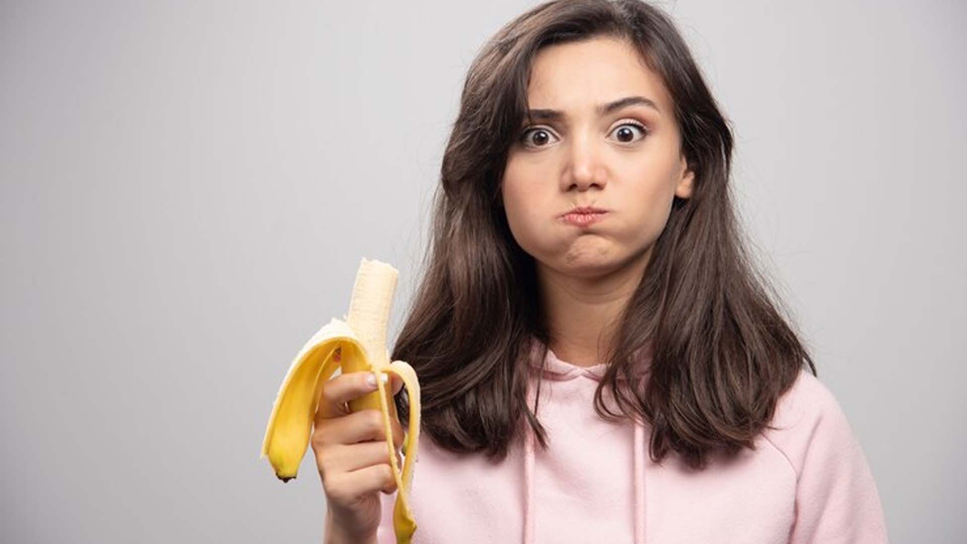 Women Eating Banana