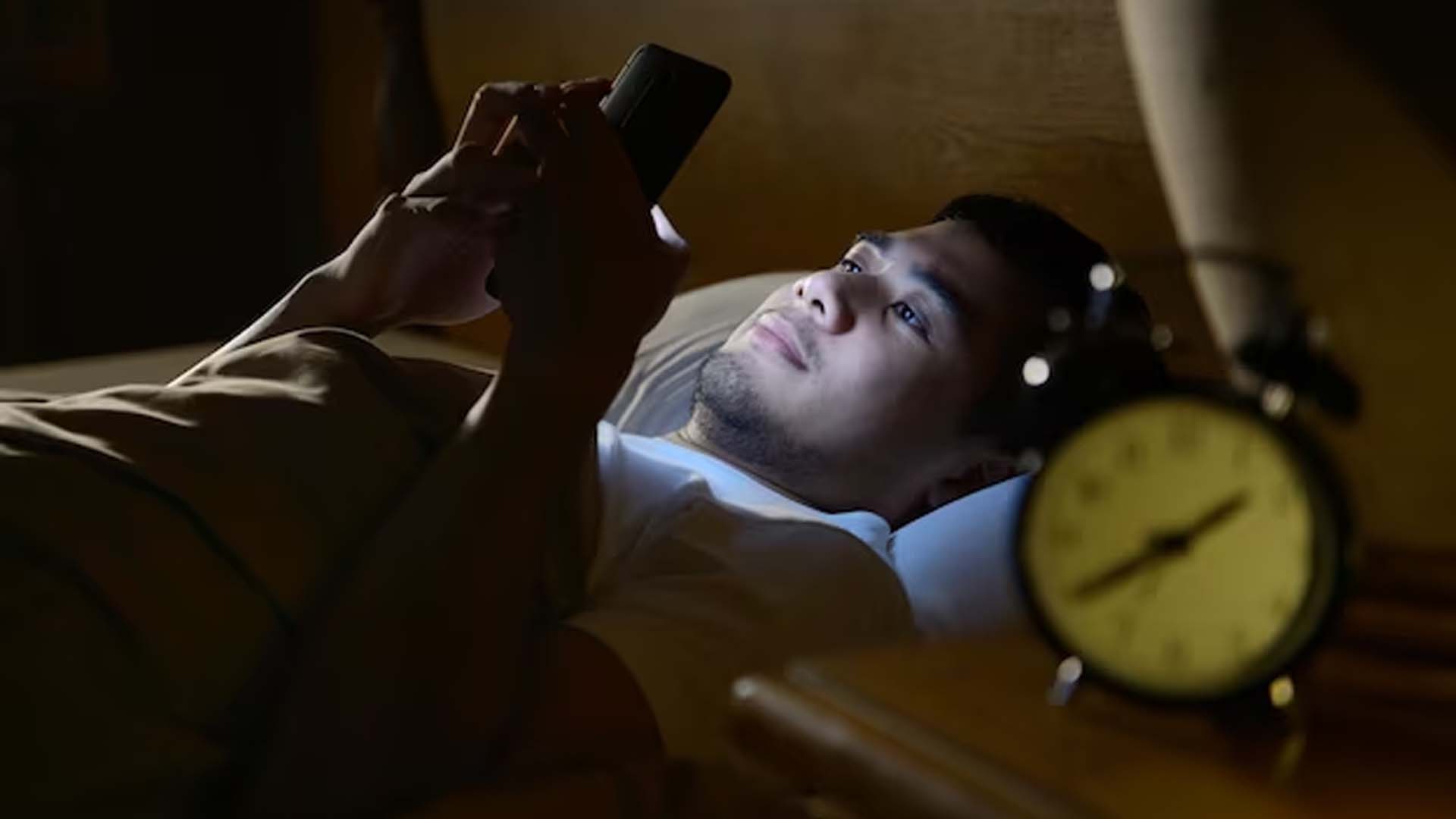 Man Using Phone at Late Night