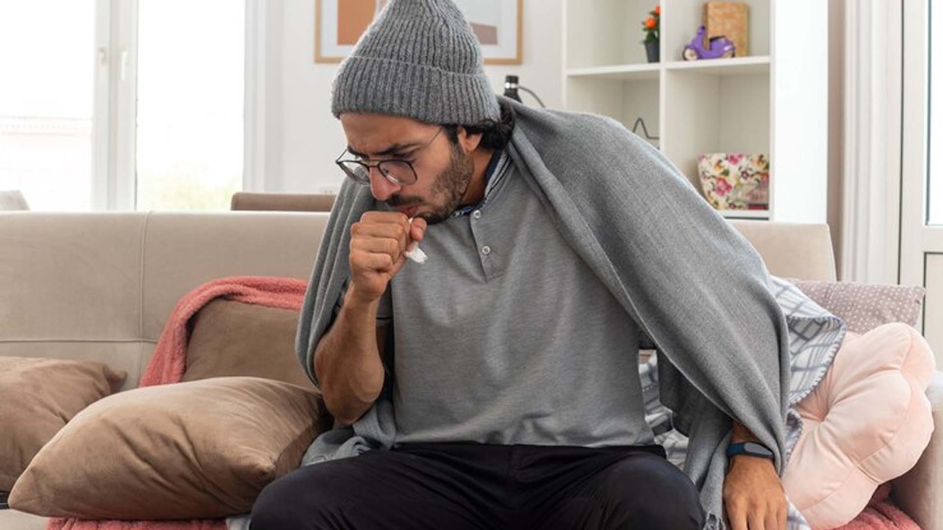 Sick man suffering with cold and cough