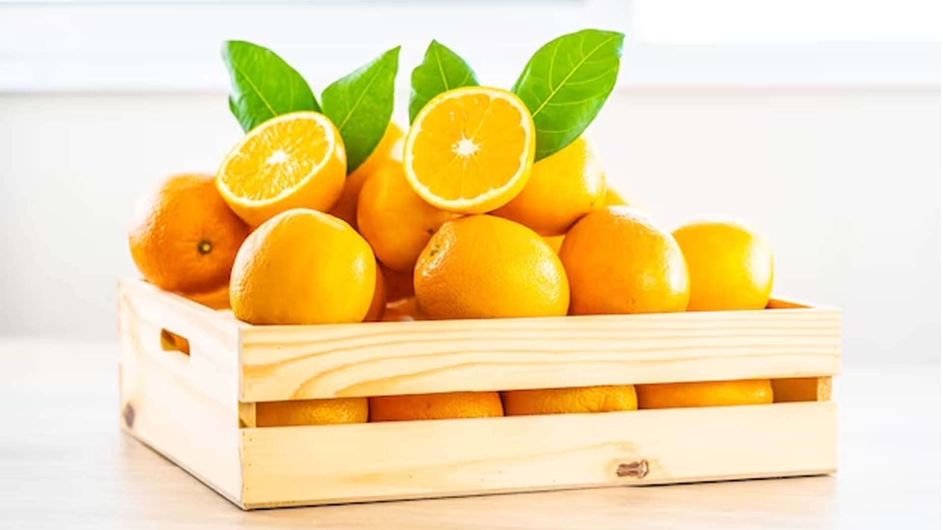 Fresh Oranges in Basket.
