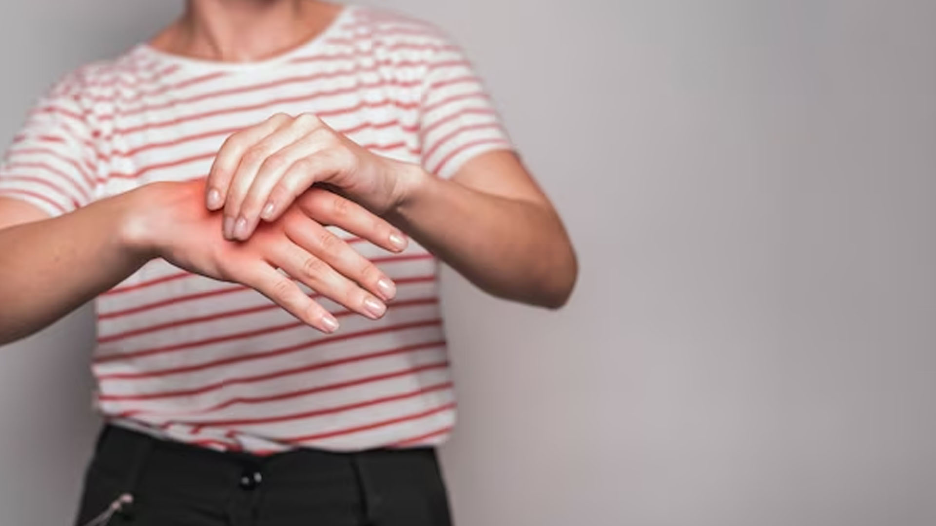 What are Red Hands a Symptom of?