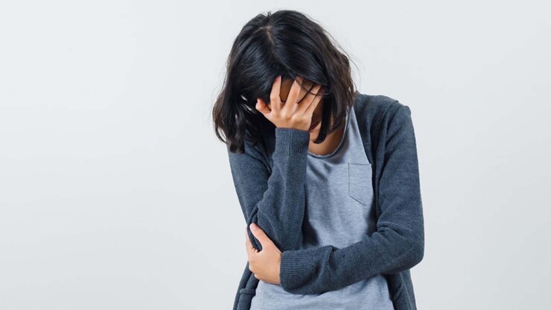 Stressful Women Holding Her Head