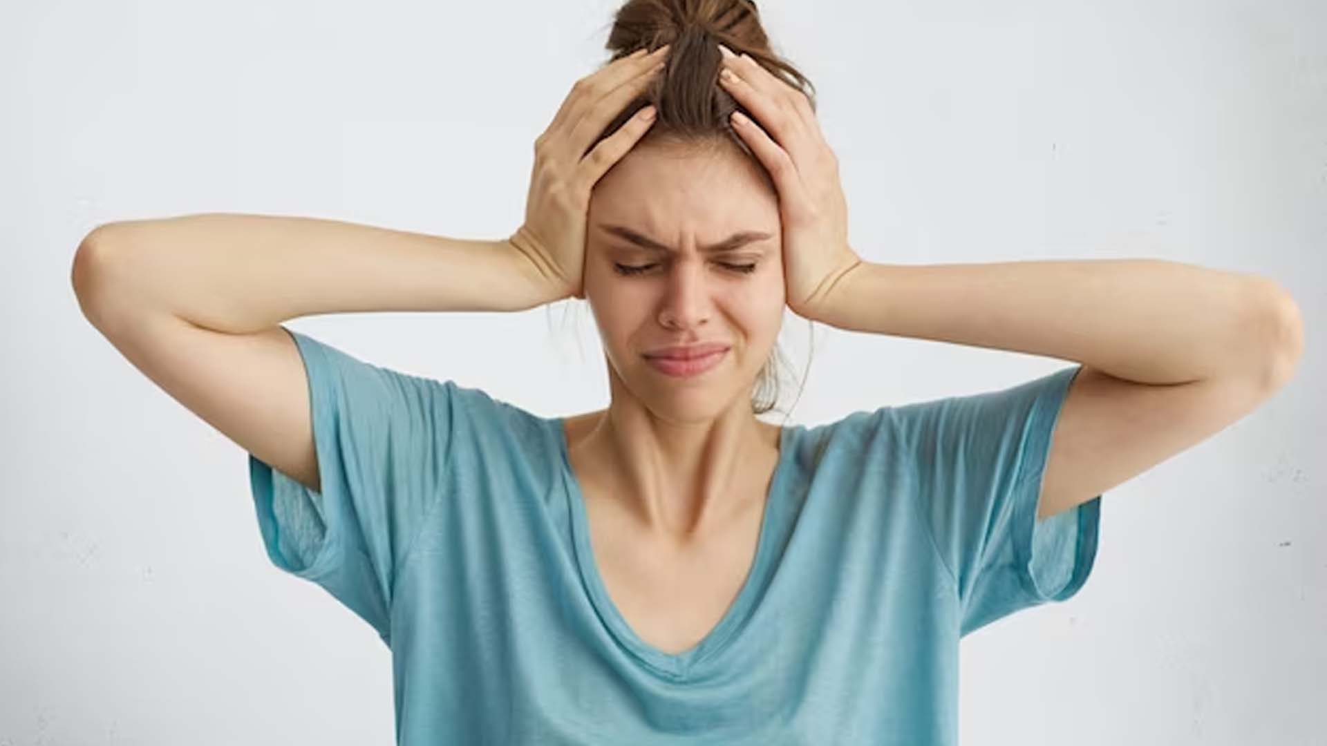 Women Suffering with Severe Headache