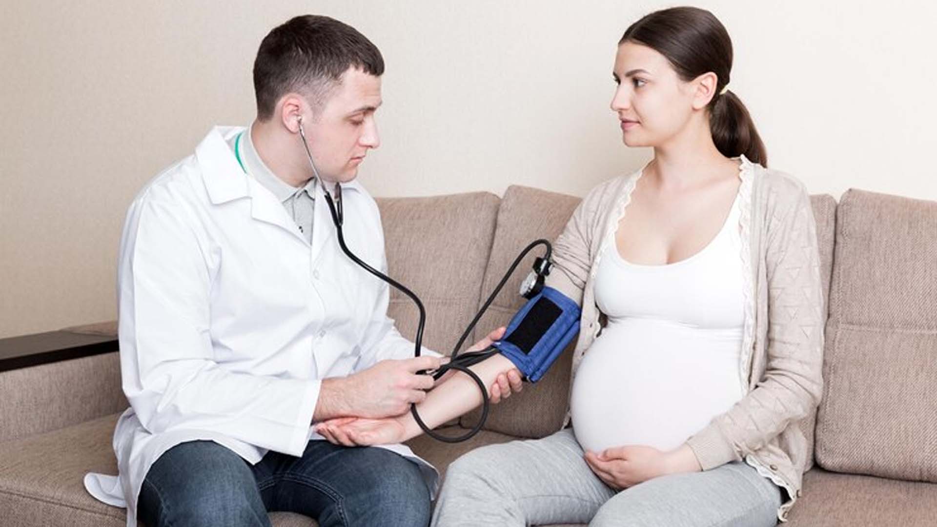 Doctor Checking Blood Pressure in Pregnancy