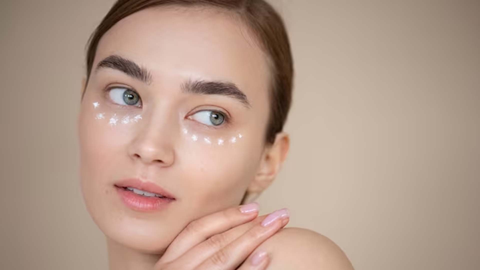 Women applied Under Eye Cream