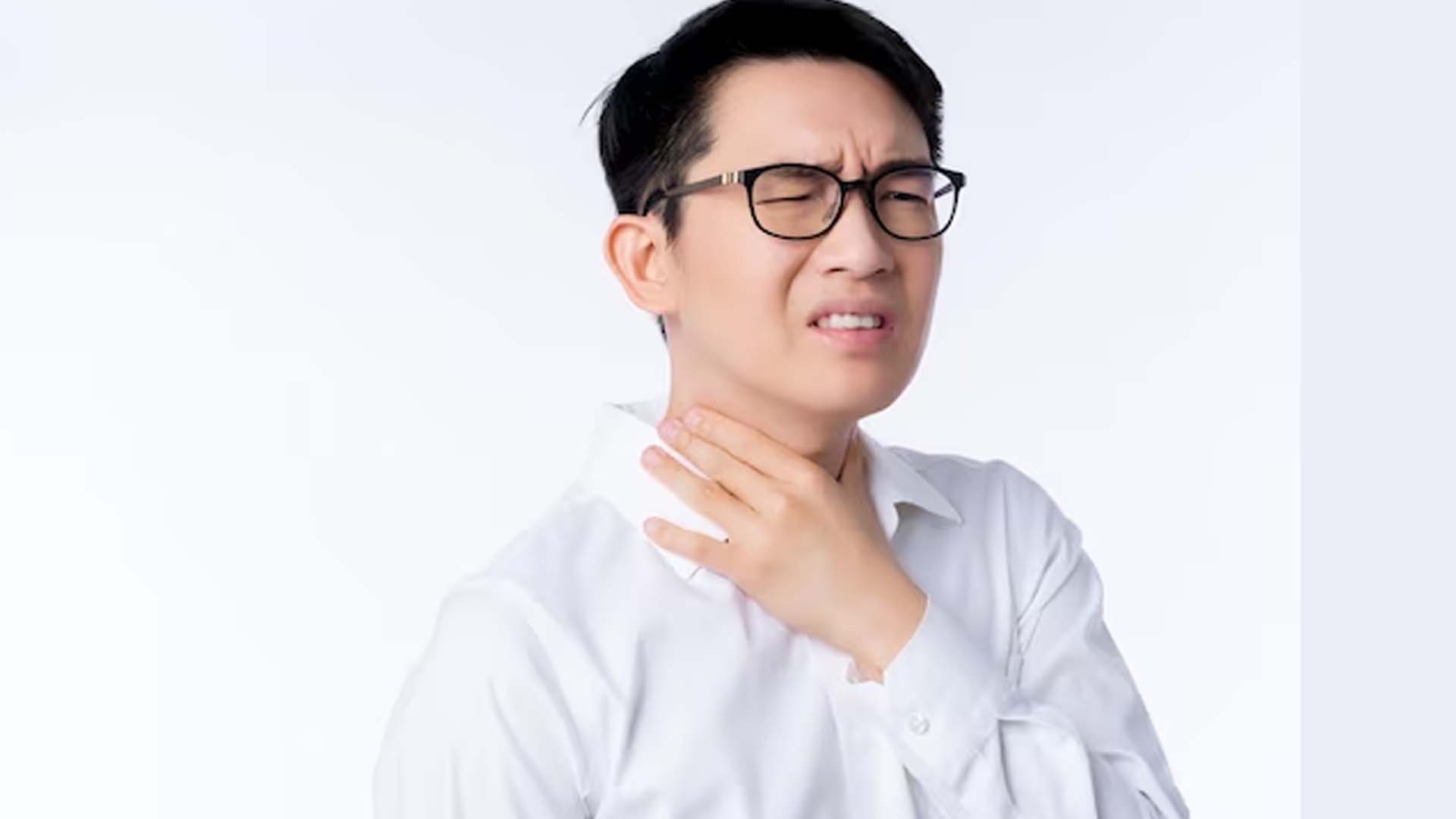 Man Holding Throat with Pain