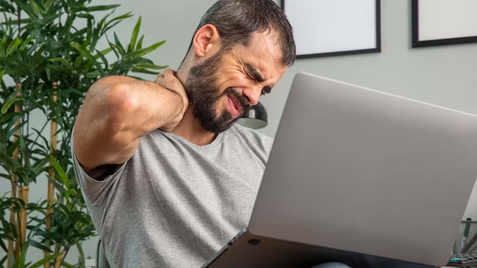 Man suffering from Neck Pain