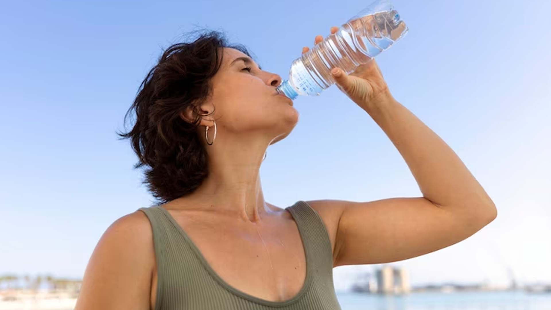 Women Drinking Bottled Water