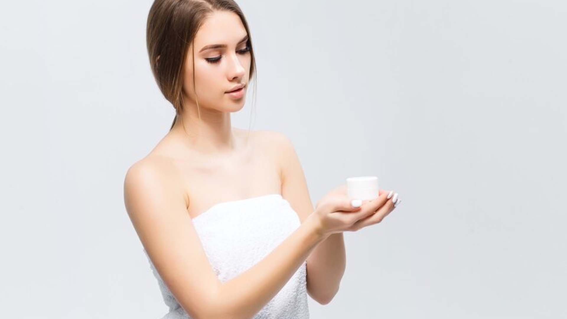 Women holding cream