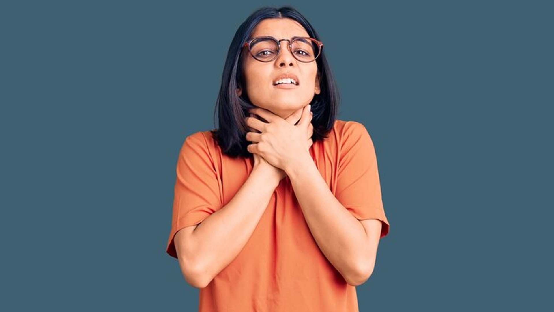 Women Holding Throat with pain or Infection