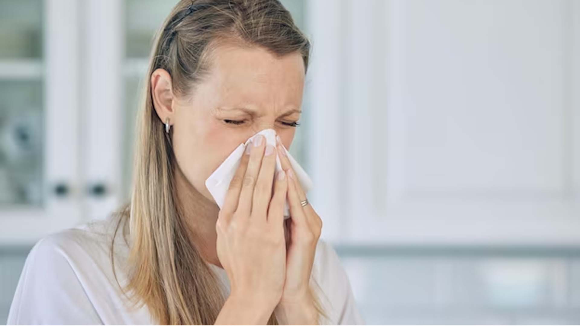 Women Sneezing Mucus or phlegm in Nose