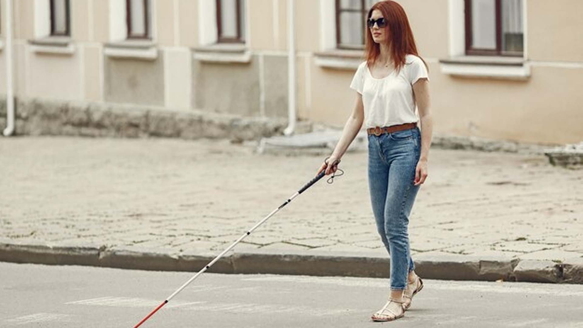 Blind Women Walking Alone on Road