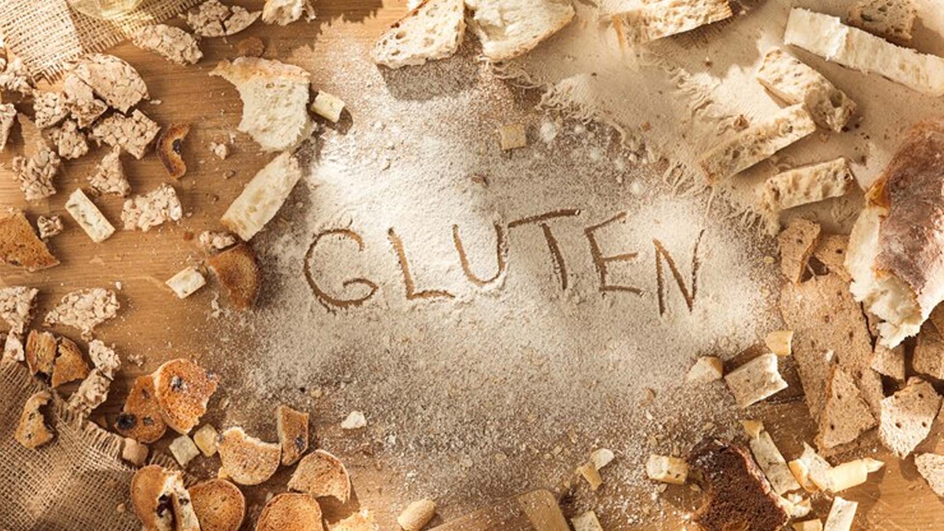 Gluten written with hand on flour