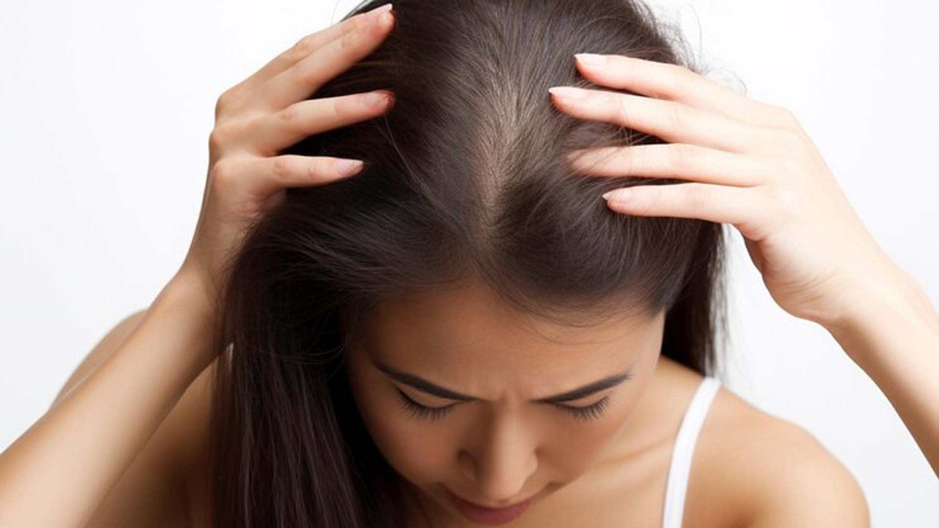 Women showing her Hair Loss