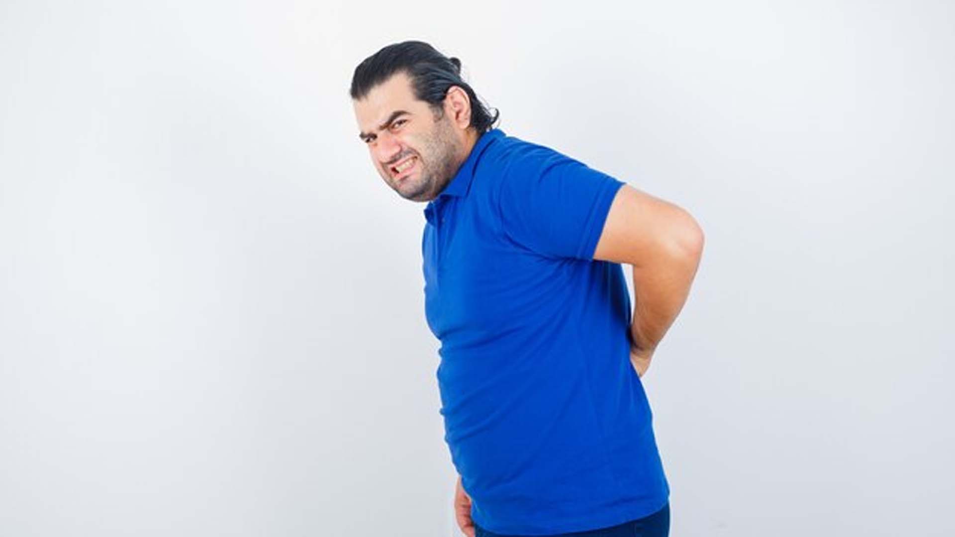 Obese Man suffering from Backache