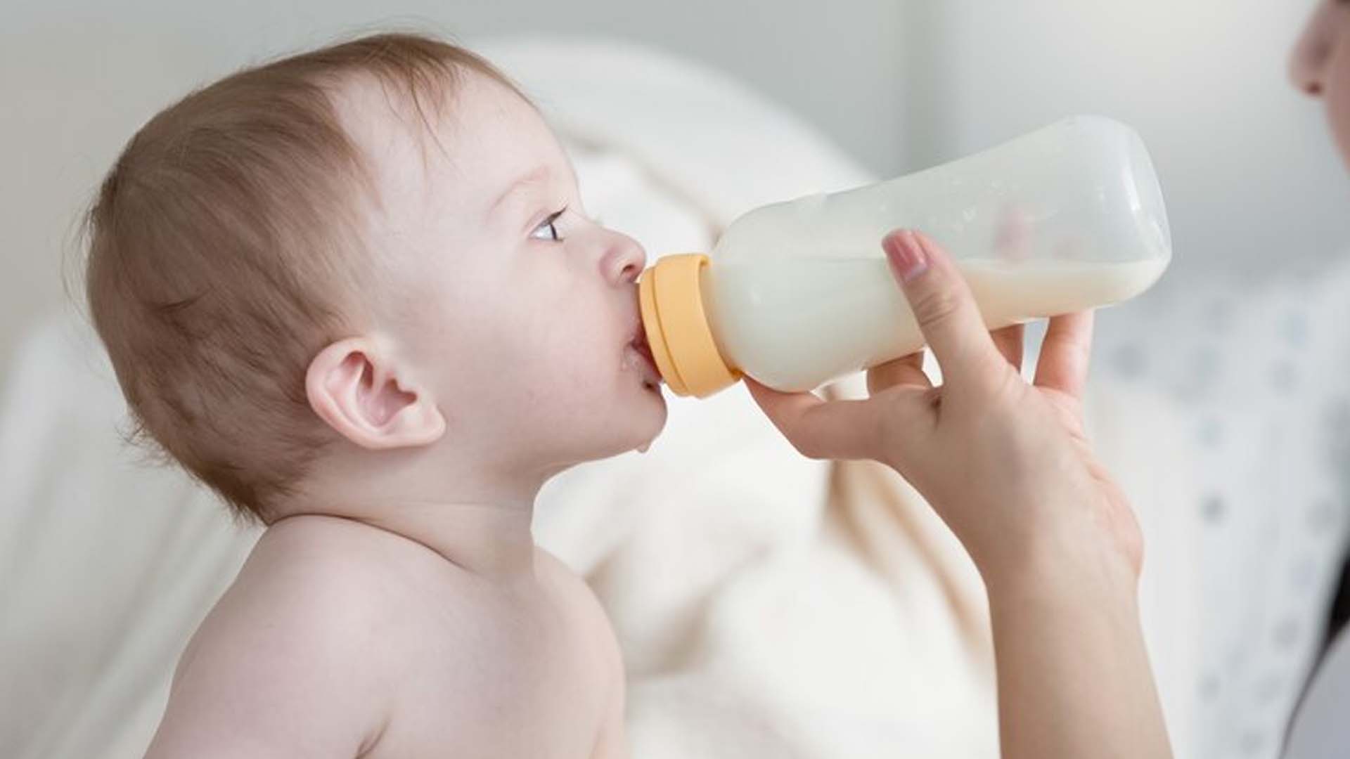 Toddler drinking milk