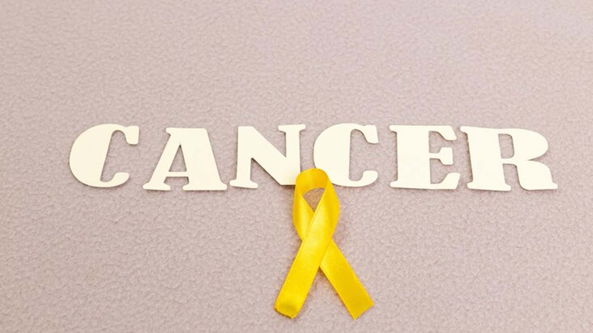 Cancer with yellow ribbon