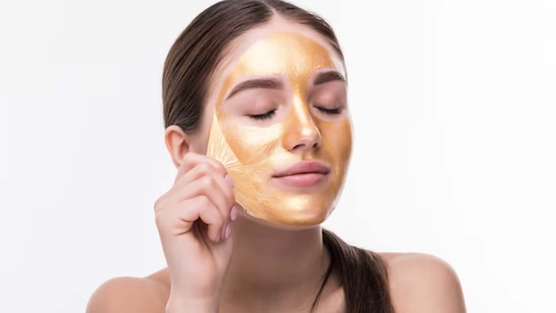 Women Peeling Off the Mask