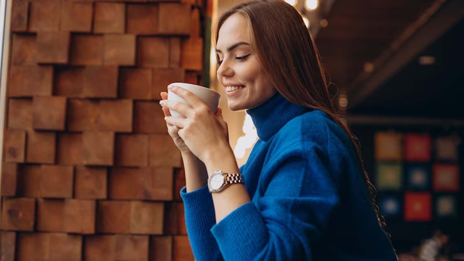 Women holding Coffee