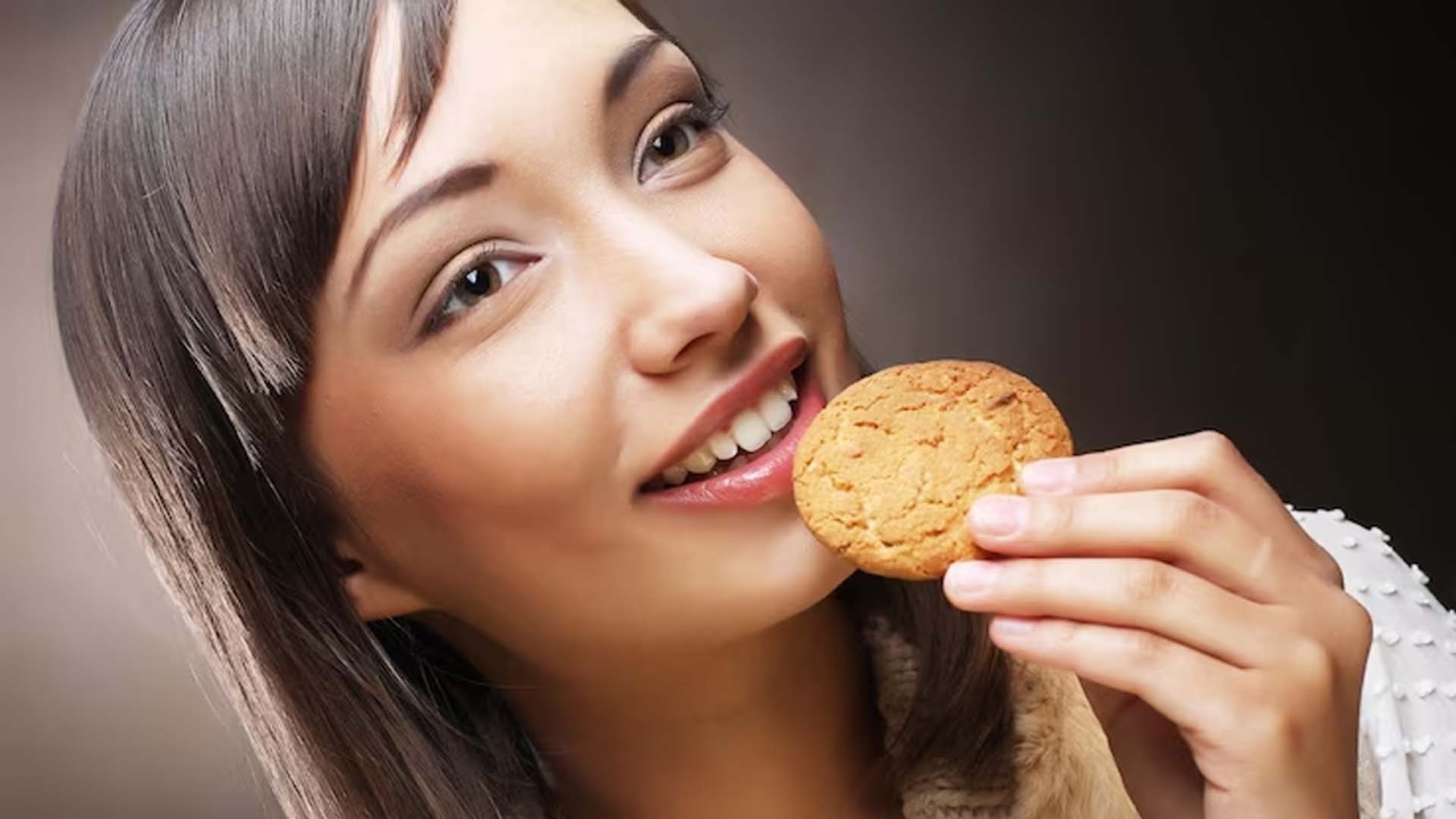 Women Eating Biscuit