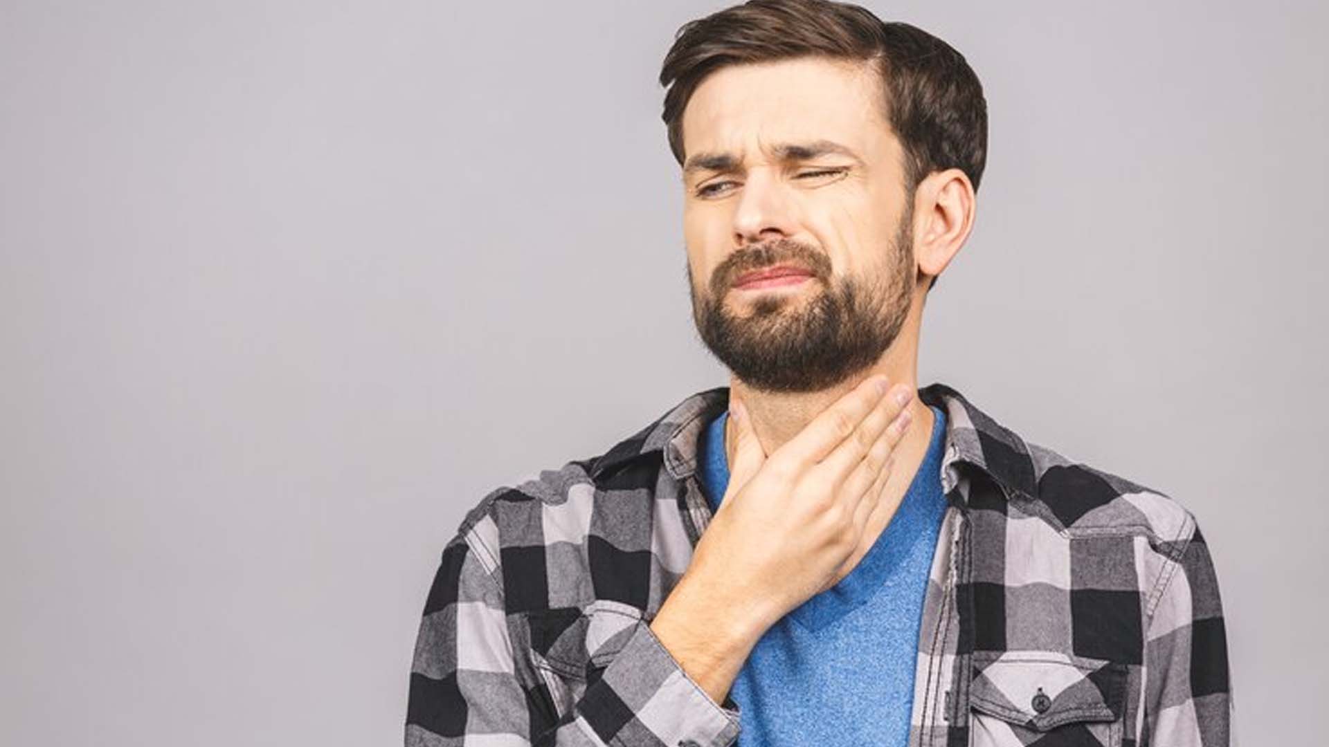 Man having Pain in the throat