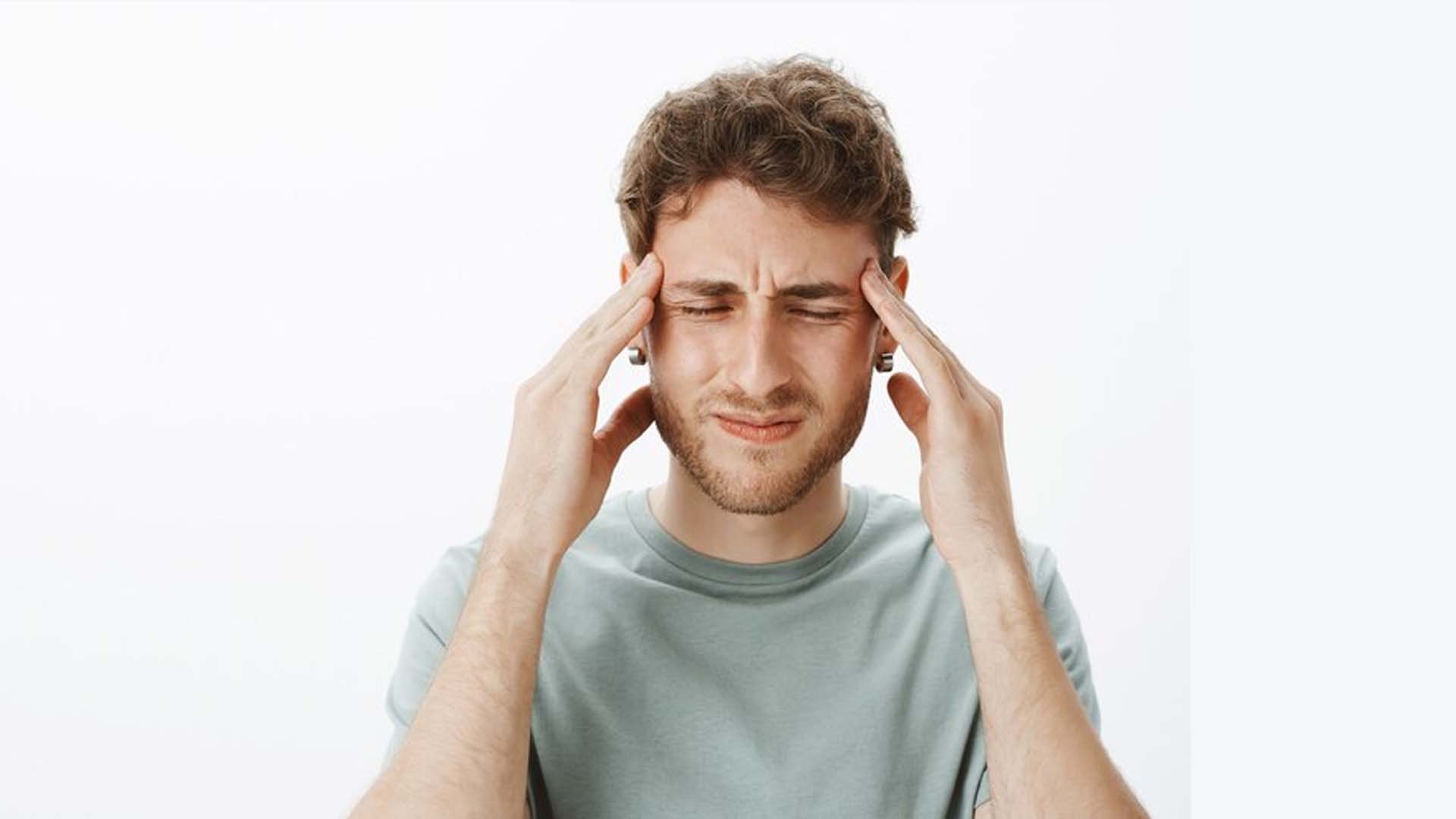 Man with Migraine pain
